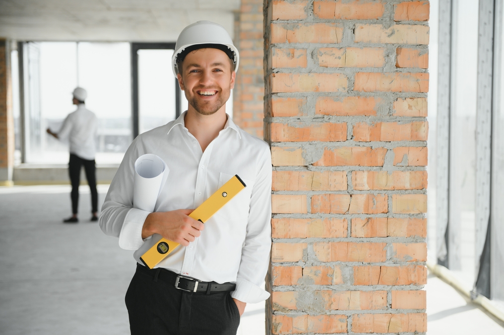 Portrait,Of,An,Architect,Builder,Studying,Layout,Plan,Of,The