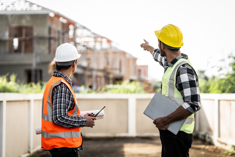 Asian,People,,Two,Man,,Holding,Blueprints,Structural,Engineers,Examine,Structural