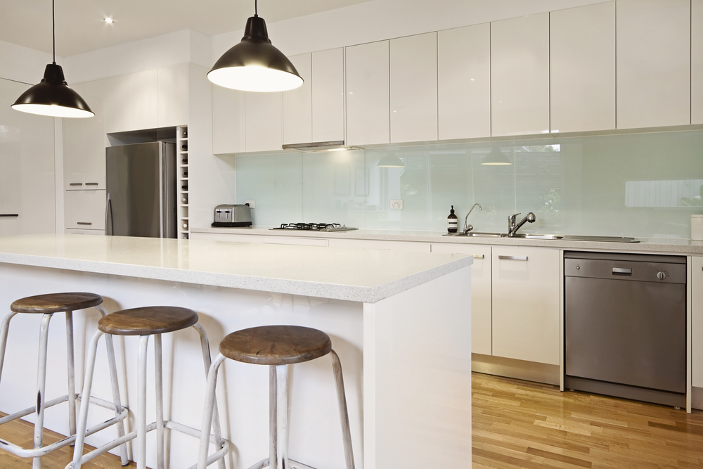 White,Contemporary,Kitchen,With,Island,And,Bar,Stools